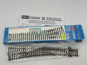 Peco OO SL-E87 Code 100 Curved Left Hand Electrofrog Point
